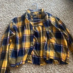 forever 21 flannel with ripped bottoms.